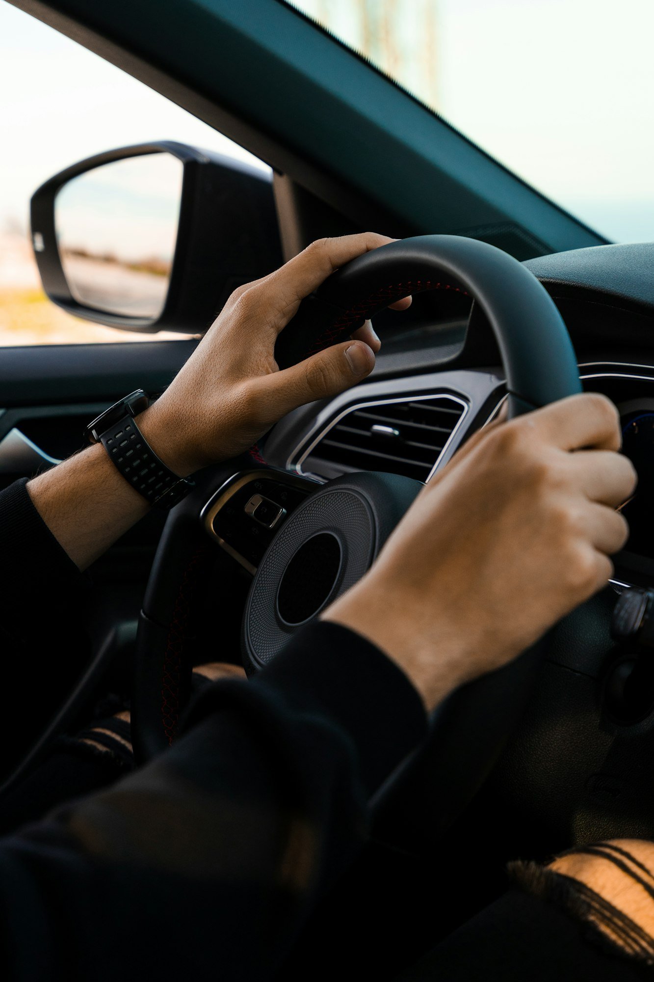 Holding the handlebars of a car